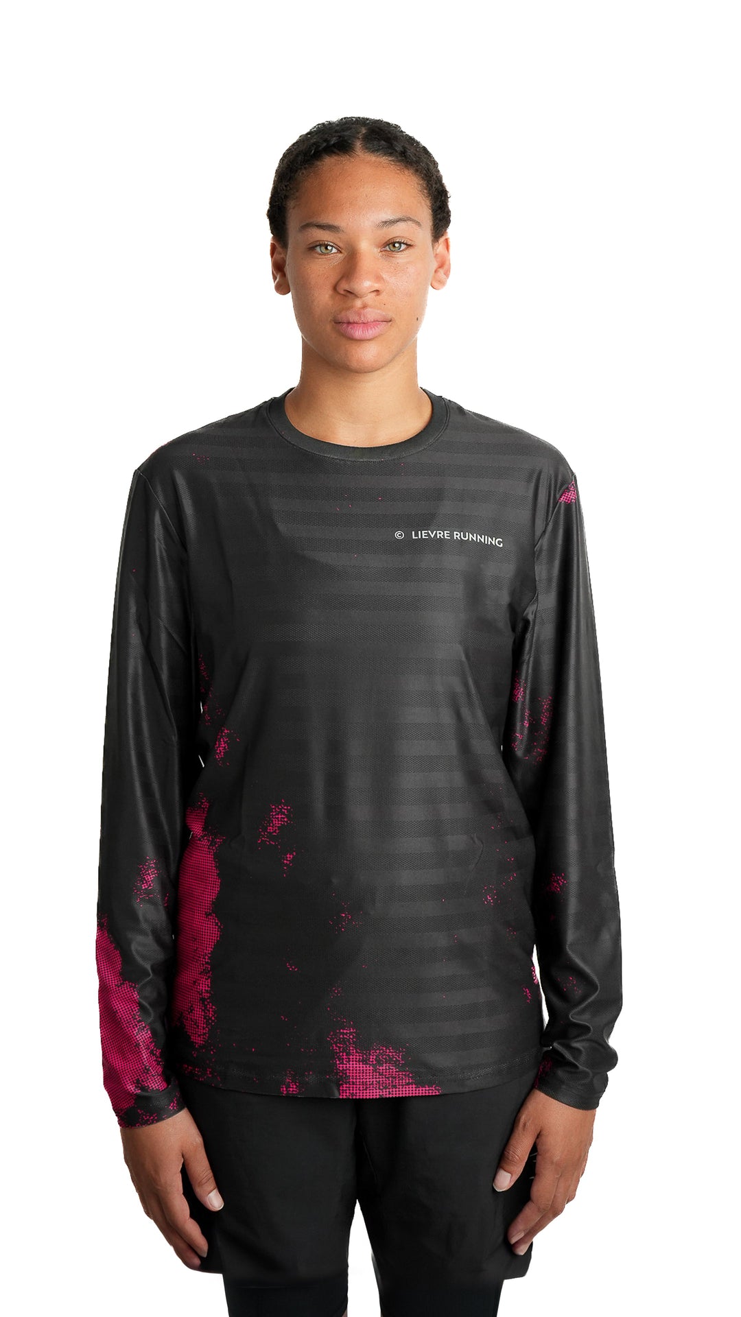 Lievre Running black long sleeve running tee, technical fabric with subtle tonal stripes and pink pixelated graphic accents on sleeves and lower body, white Lievre Running logo on chest.
