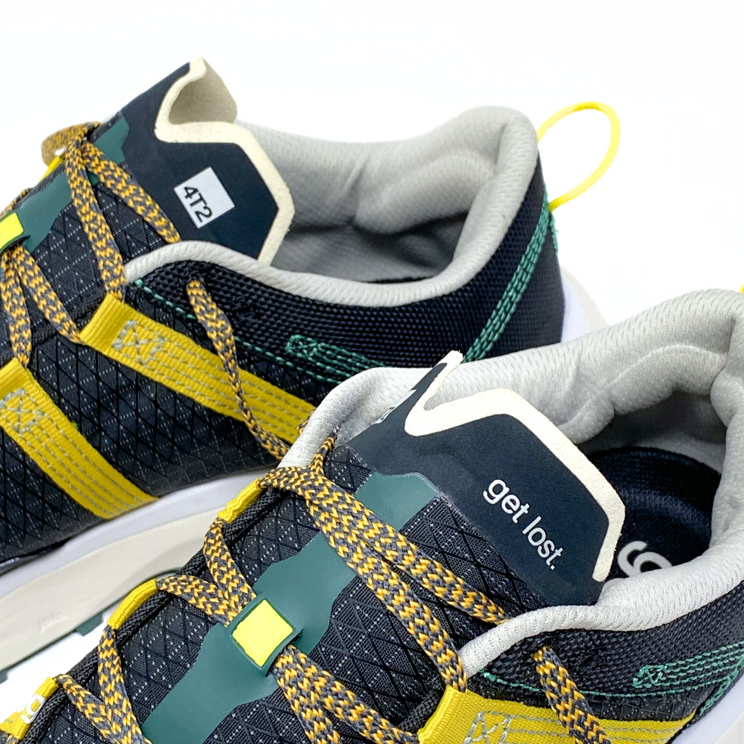 4T2 get lost running shoe in black and yellow, designed for trail running with Vibram outsole.