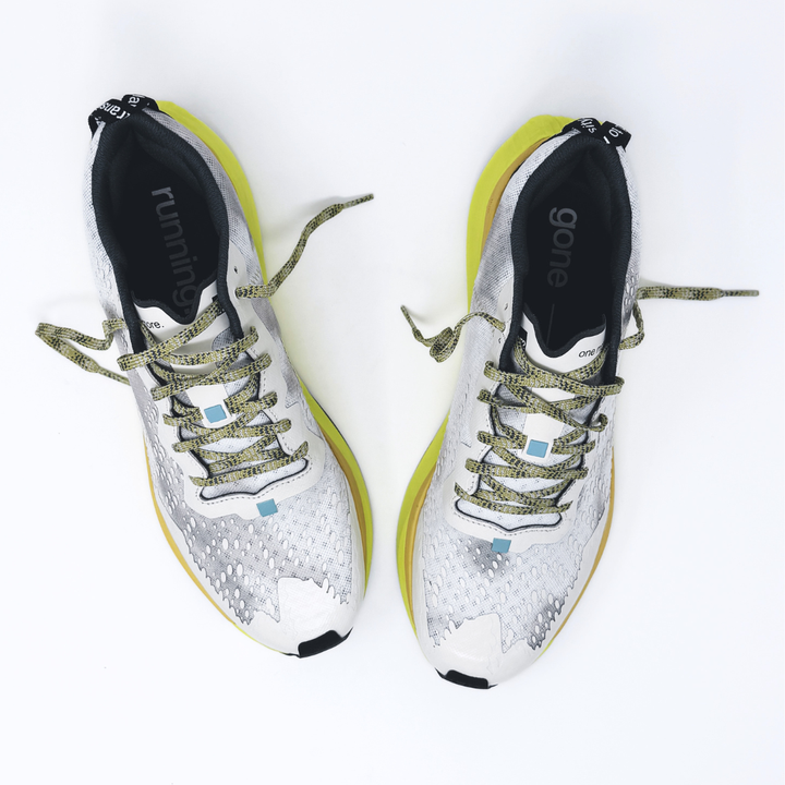 4T2 one more, acid dreams running shoes in white and yellow color featuring a lightweight design and grippy outsole