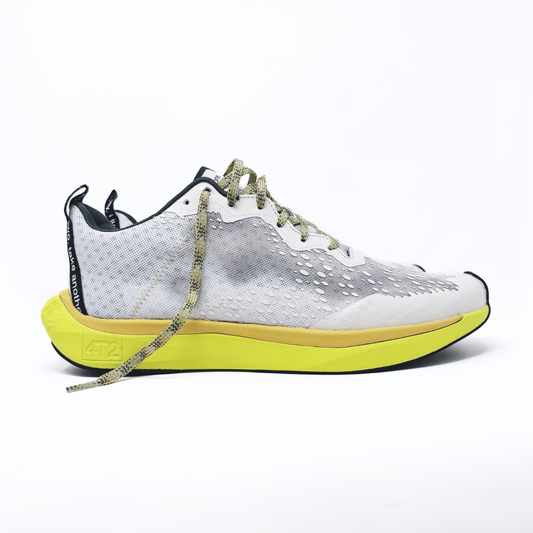 4T2 one more, acid dreams running shoes in white and yellow color featuring a lightweight design and grippy outsole
