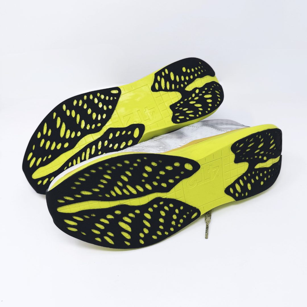 4T2 one more, acid dreams running shoes in white and yellow color featuring a lightweight design and grippy outsole