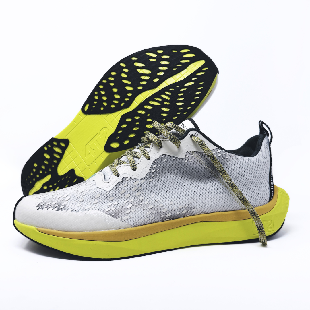 4T2 one more, acid dreams running shoes in white and yellow color featuring a lightweight design and grippy outsole