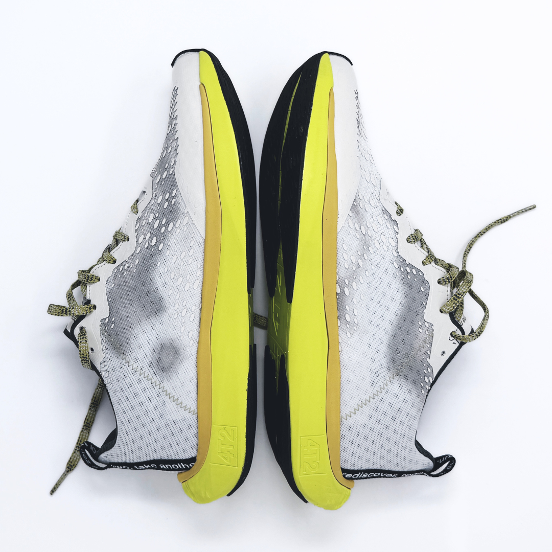 4T2 one more, acid dreams running shoes in white and yellow color featuring a lightweight design and grippy outsole