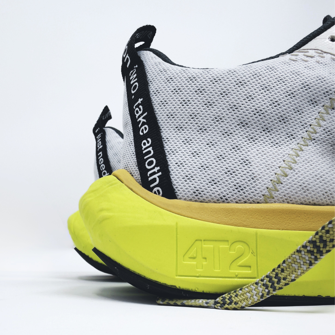4T2 one more, acid dreams running shoes in white and yellow color featuring a lightweight design and grippy outsole