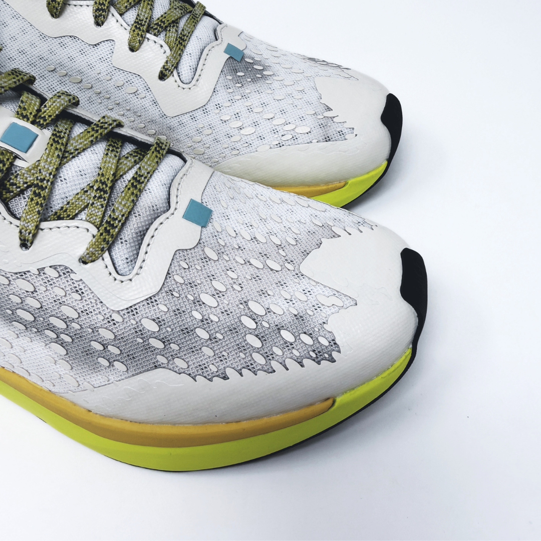 4T2 one more, acid dreams running shoes in white and yellow color featuring a lightweight design and grippy outsole