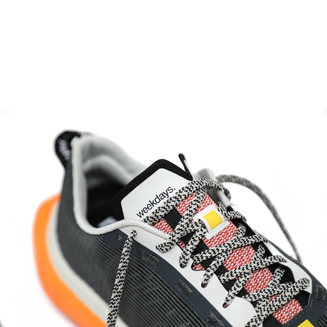 4T2 weekdays running shoes showcasing a comfortable and neutral design with a wider base for stability.