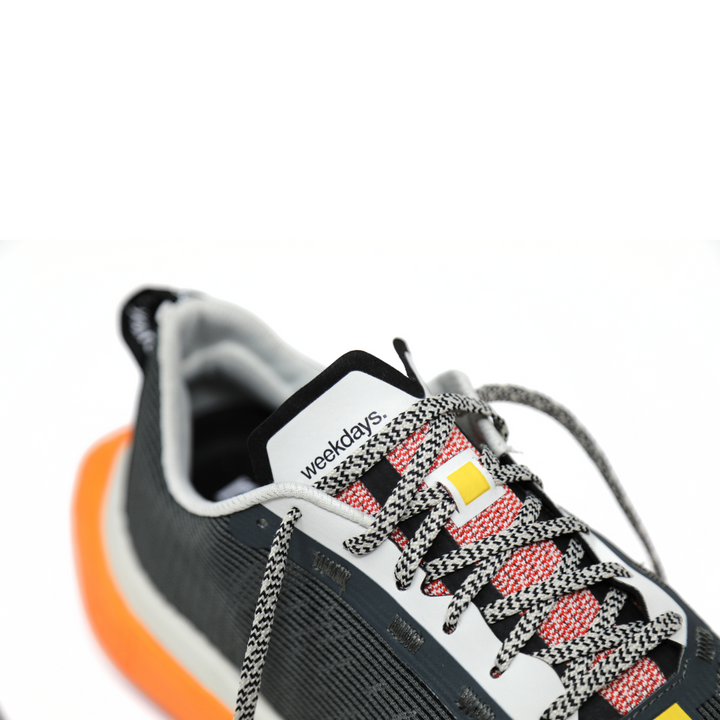 4T2 weekdays running shoes showcasing a comfortable and neutral design with a wider base for stability.
