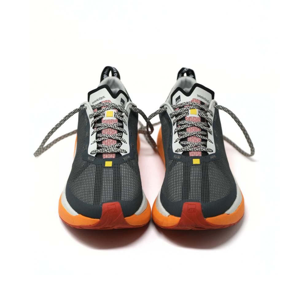 4T2 weekdays running shoes showcasing a comfortable and neutral design with a wider base for stability.