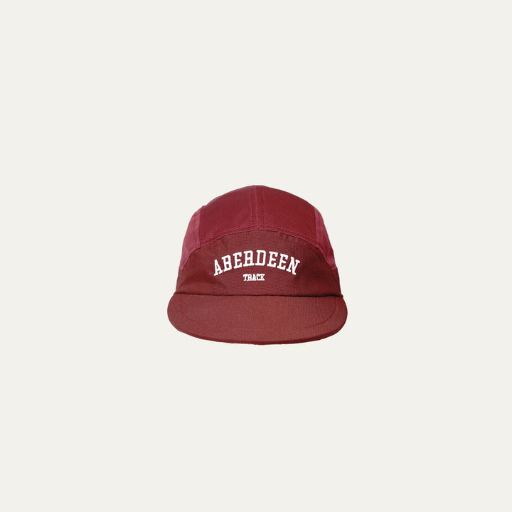 Participation Aberdeen running cap, maroon 5-panel with curved brim and white “ABERDEEN TRACK” embroidery.