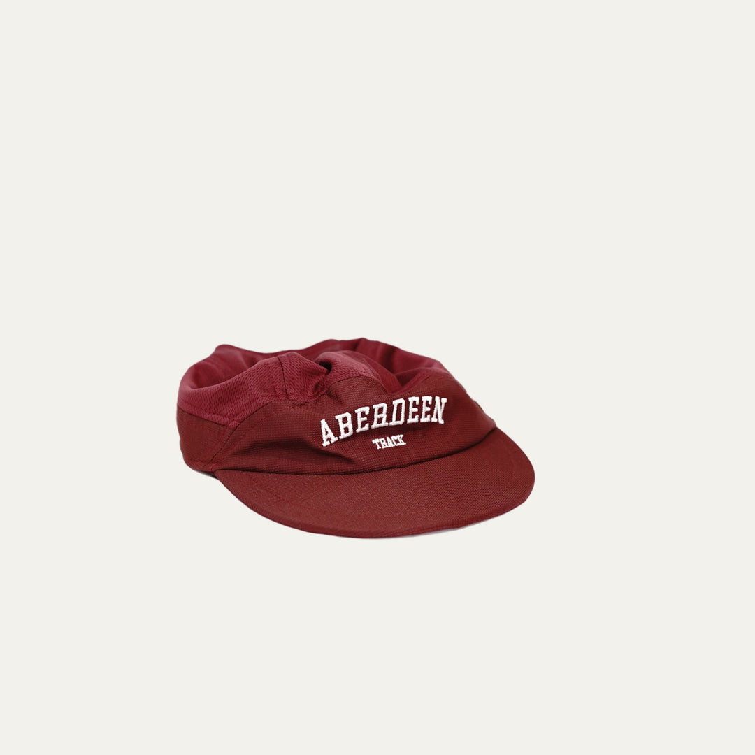 Participation Aberdeen running cap, maroon 5-panel with curved brim and white “ABERDEEN TRACK” embroidery.