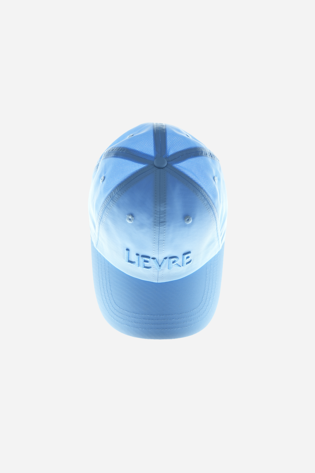 Lievre Running Signature Haze Blue Cap, ultra-lightweight nylon construction with DWR waterproof finish and minimal design, adjustable back strap.