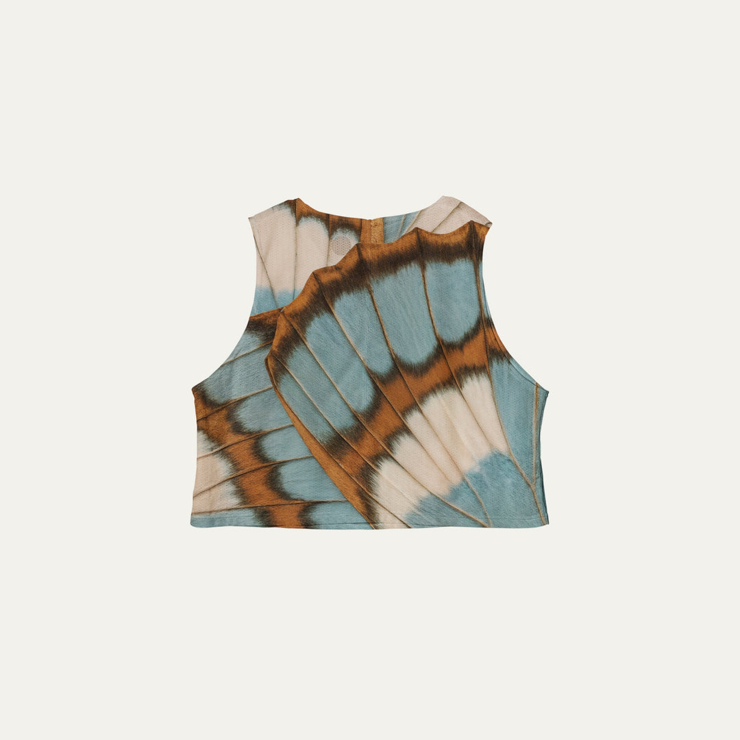 Participation butterfly crop singlet, breathable mesh, teal–tan wing print, white circle logo on chest.