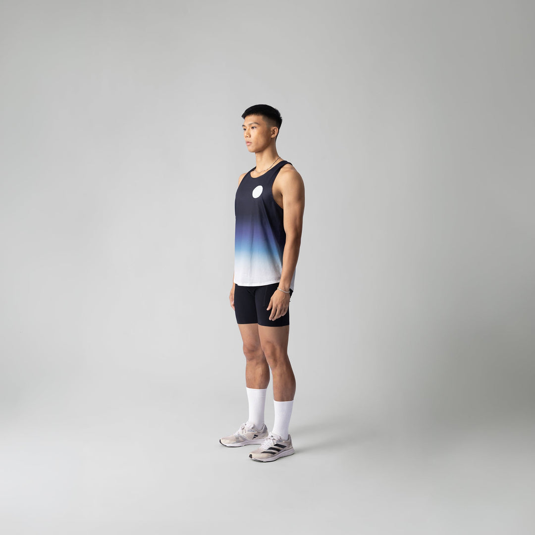 Participation Cold Gradient Singlet in a stylish gradient from black to blue and white, perfect for activewear.