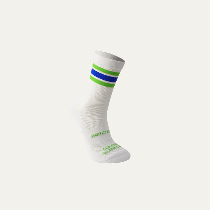 Participation Blue in Green running socks, breathable white mesh with blue-green cuff stripes, green foot branding.
