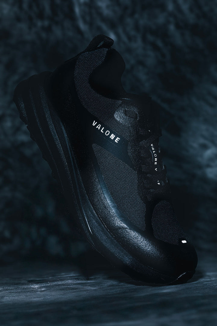 Detail of the black Valone Rave Arnev, technical trail running shoe made in Europe