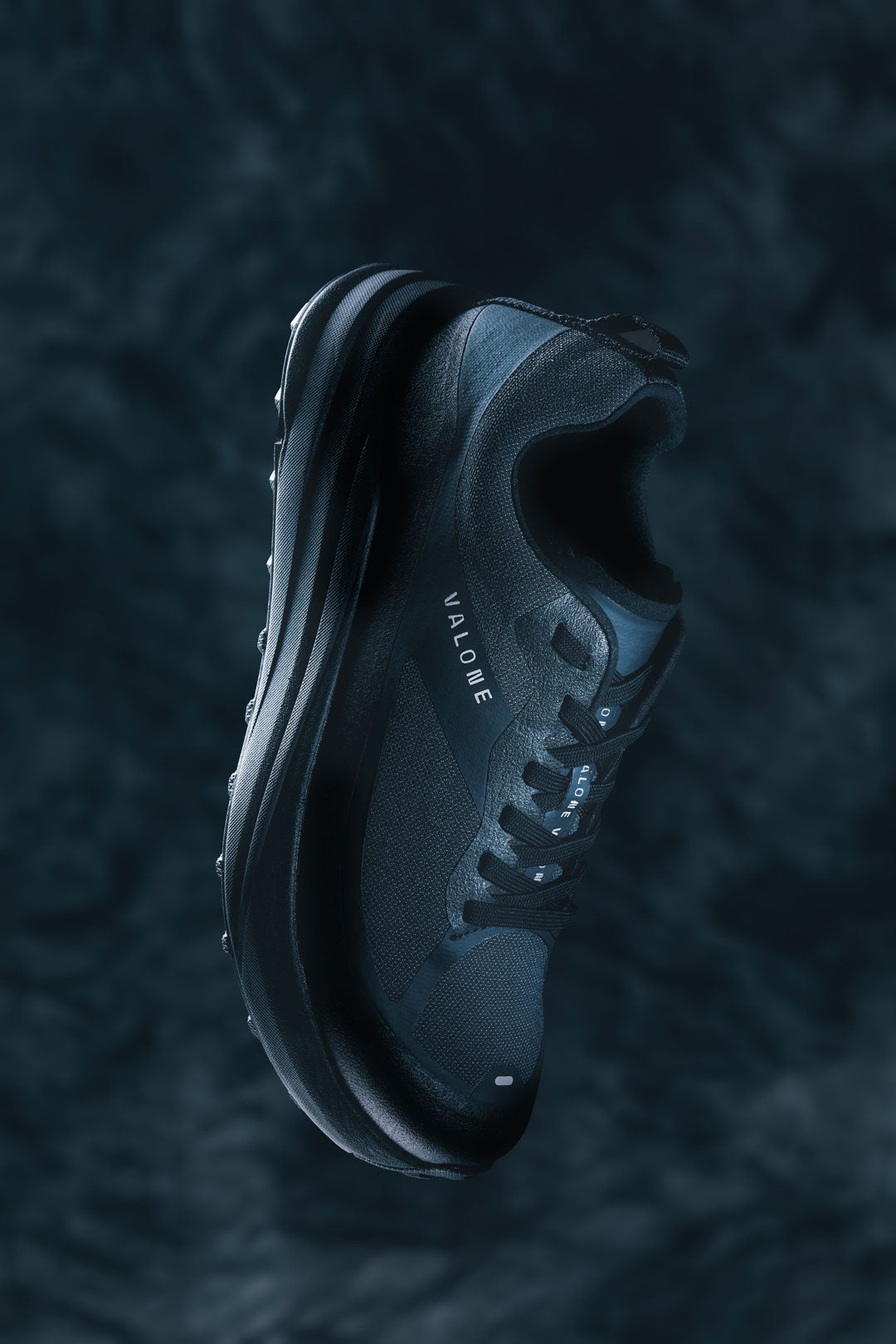 Detail of the black Valone Rave Arnev, technical trail running shoe made in Europe