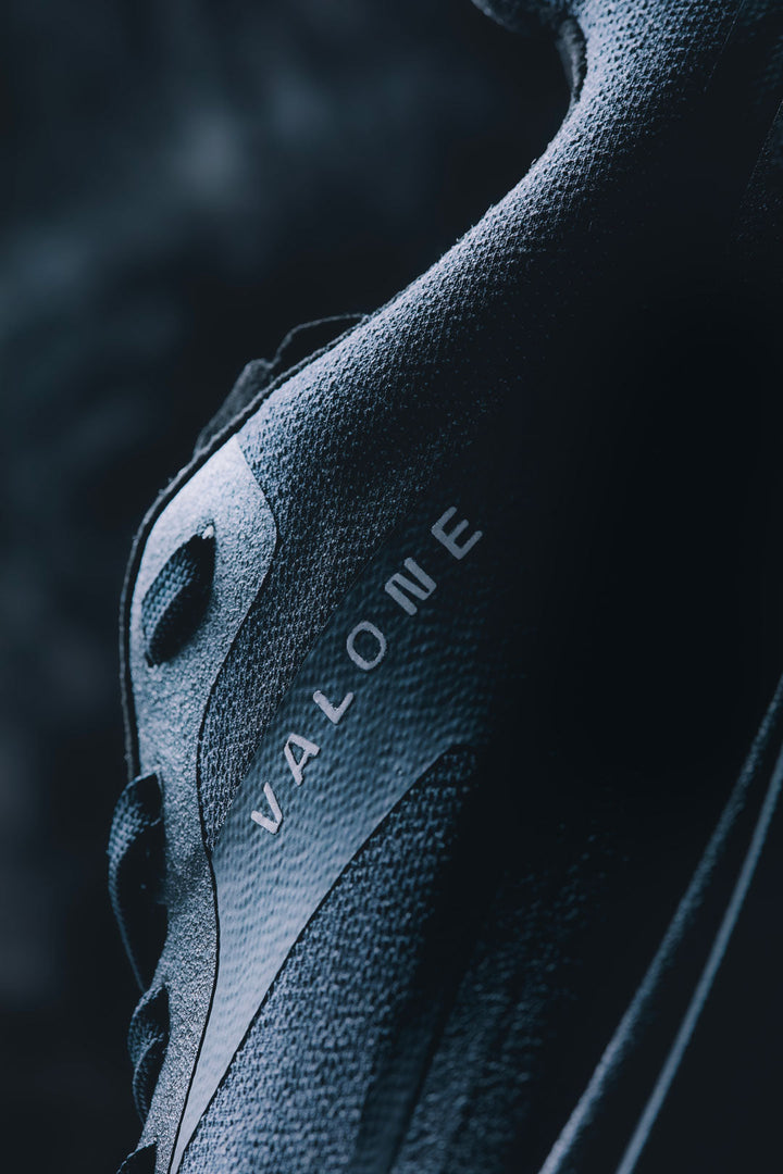 Detail of the black Valone Rave Arnev, technical trail running shoe made in Europe