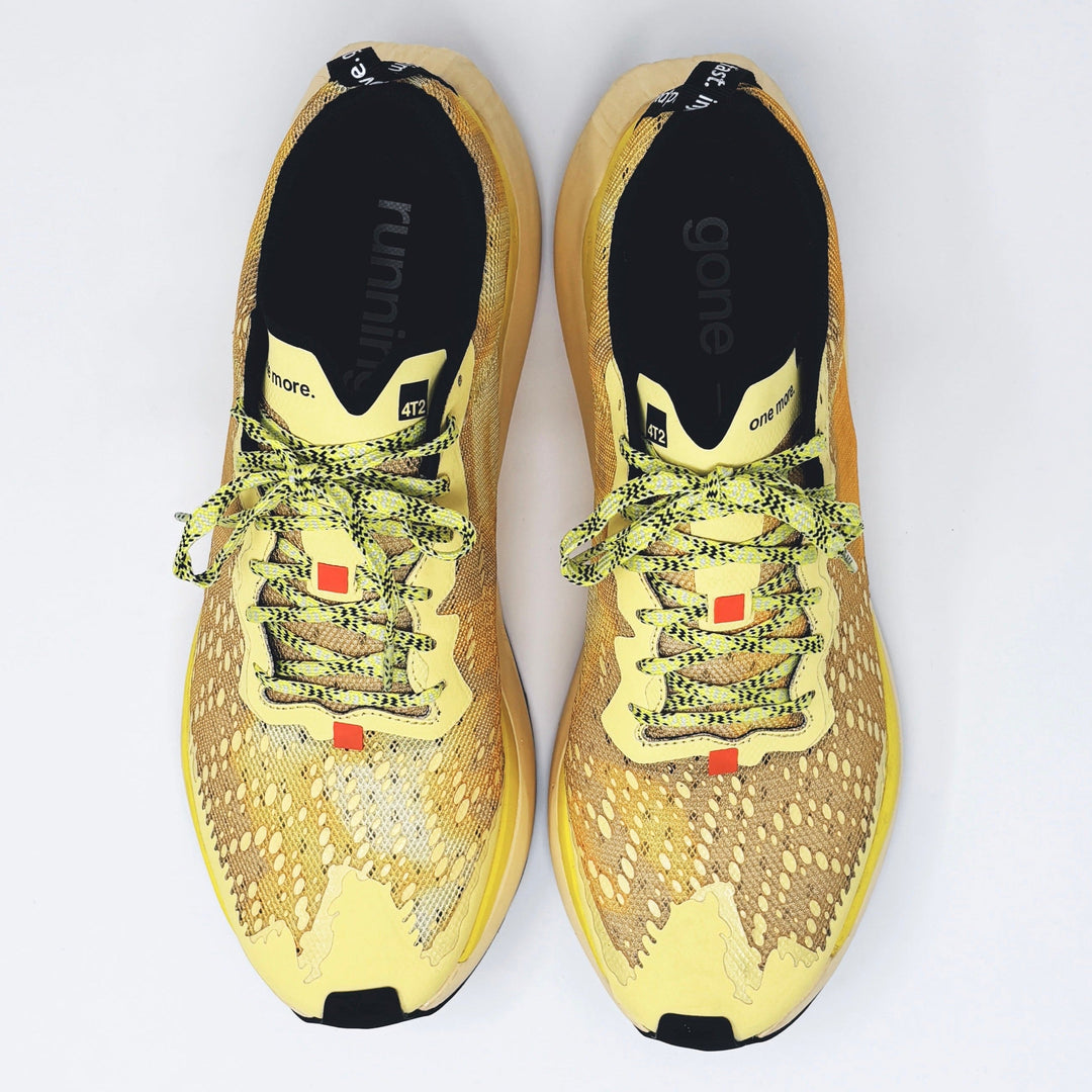 4T2 one more running shoes in yellow color featuring a lightweight design and grippy outsole.