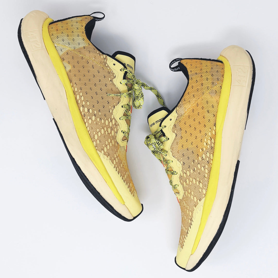 4T2 one more running shoes in yellow color featuring a lightweight design and grippy outsole.