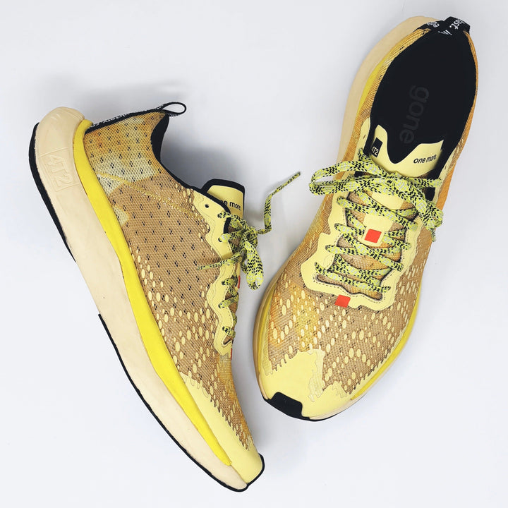 4T2 one more running shoes in yellow color featuring a lightweight design and grippy outsole.