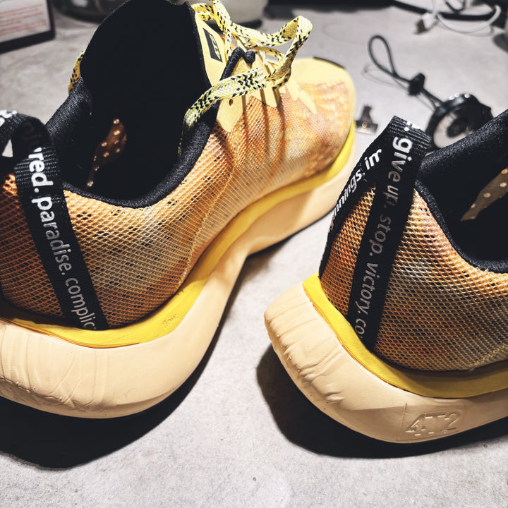 4T2 one more running shoes in yellow color featuring a lightweight design and grippy outsole.