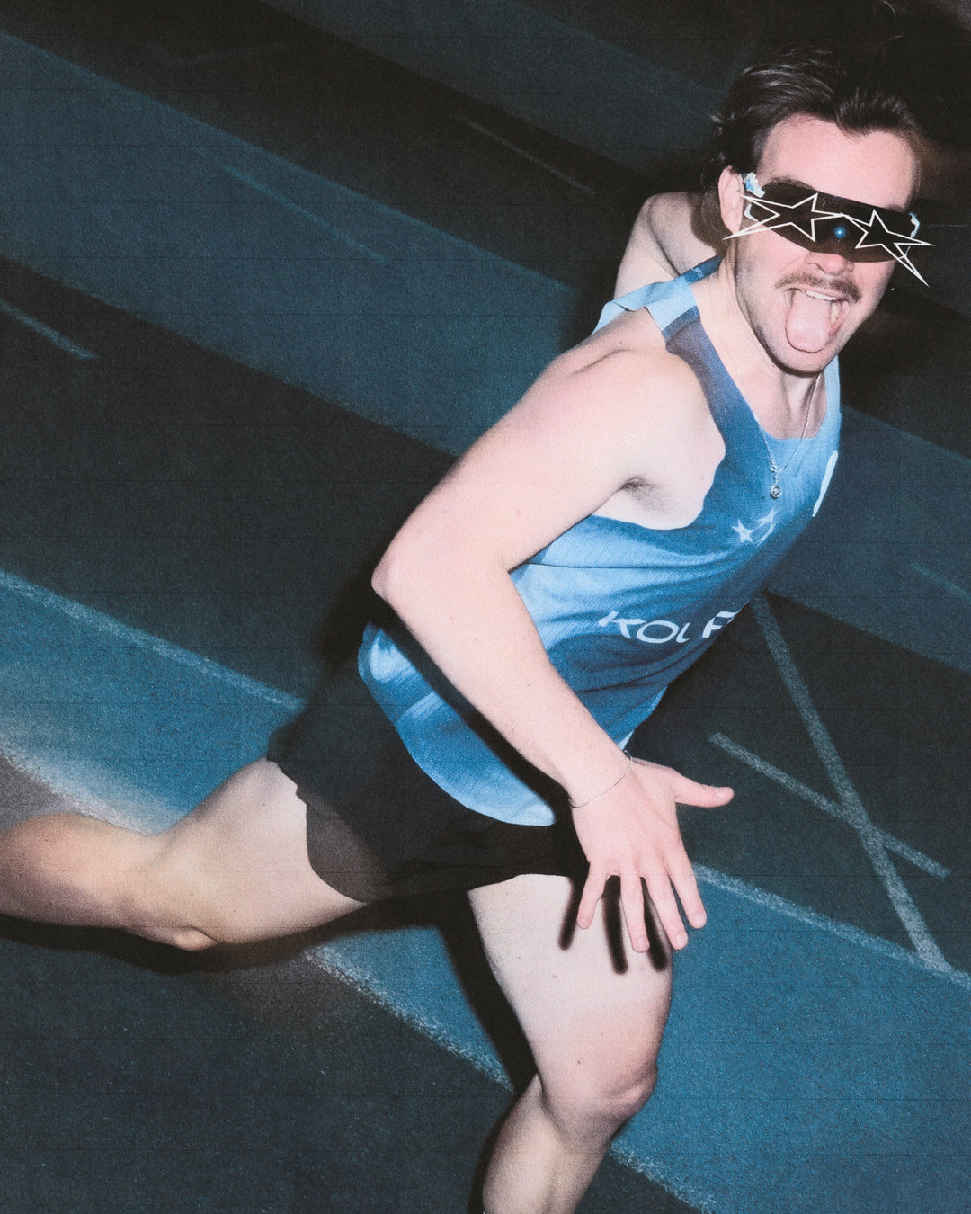 Limited Edition Participation Koureur Running Singlet in blue with white accents displayed on a hanger.