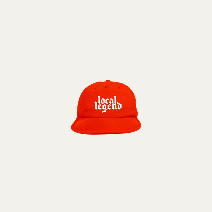 Participation Local Legend cap, bright red 5-panel with curved brim and white “local legend” embroidery.