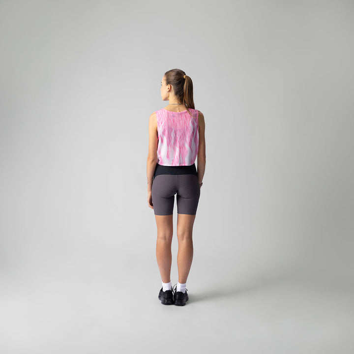 Participation Pink Fuzz Crop Singlet in pink and white with flame design, suitable for activewear.