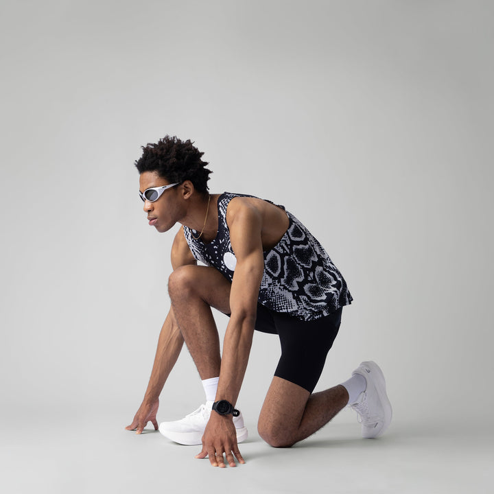 A detailed image of the Participation Python Singlet showcasing its breathable fabric and design, suitable for activewear.