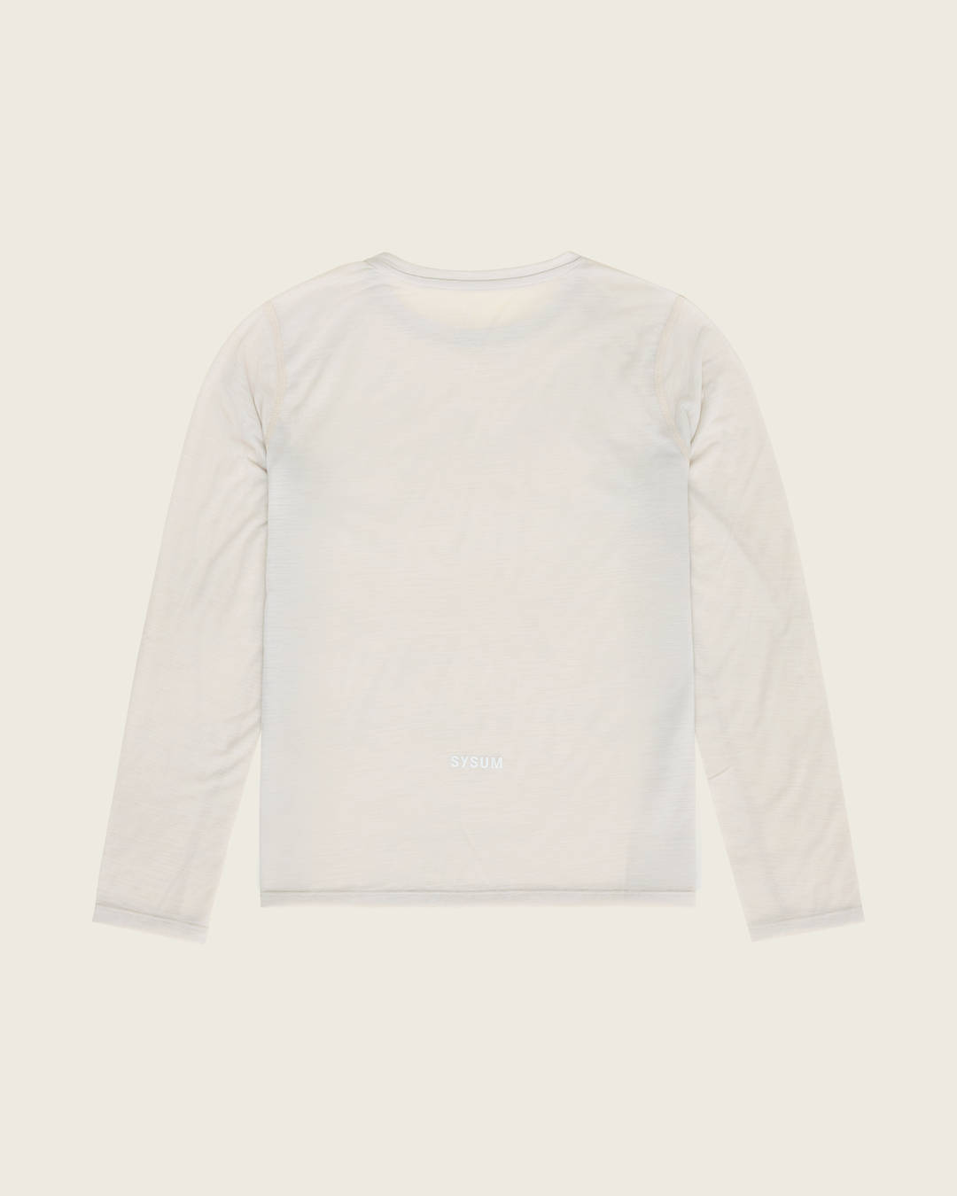 Women’s ultra-light merino long-sleeve running top in Pebble from Sysum, fine knit texture visible, photographed in a neutral studio setting.