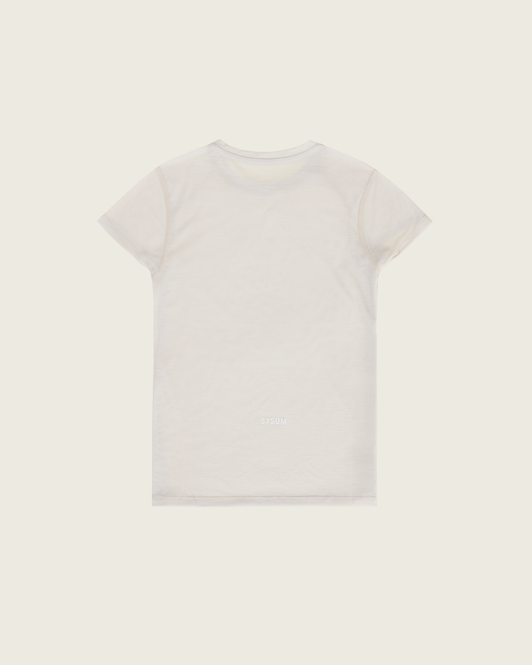 Women’s ultra-light merino short-sleeve running tee in Pebble from Sysum, fine knit texture visible, photographed in a neutral studio setting.