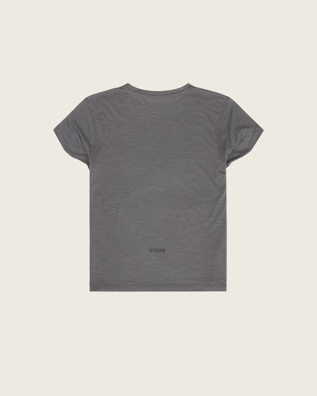 Women’s merino short-sleeve running tee in Slate from Sysum, lightweight knit texture visible, photographed in a neutral studio setting.