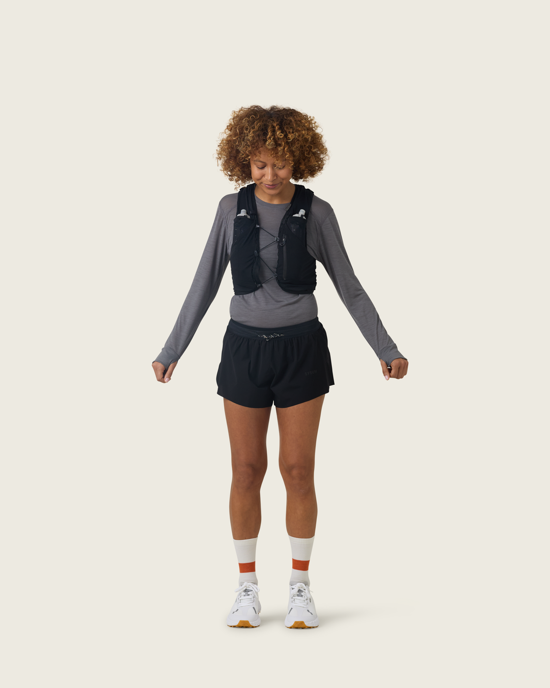Women’s 3-inch Cordura® trail running shorts in Sap from Sysum, ultra-light stretch fabric and pocket system visible, photographed in a neutral studio setting.