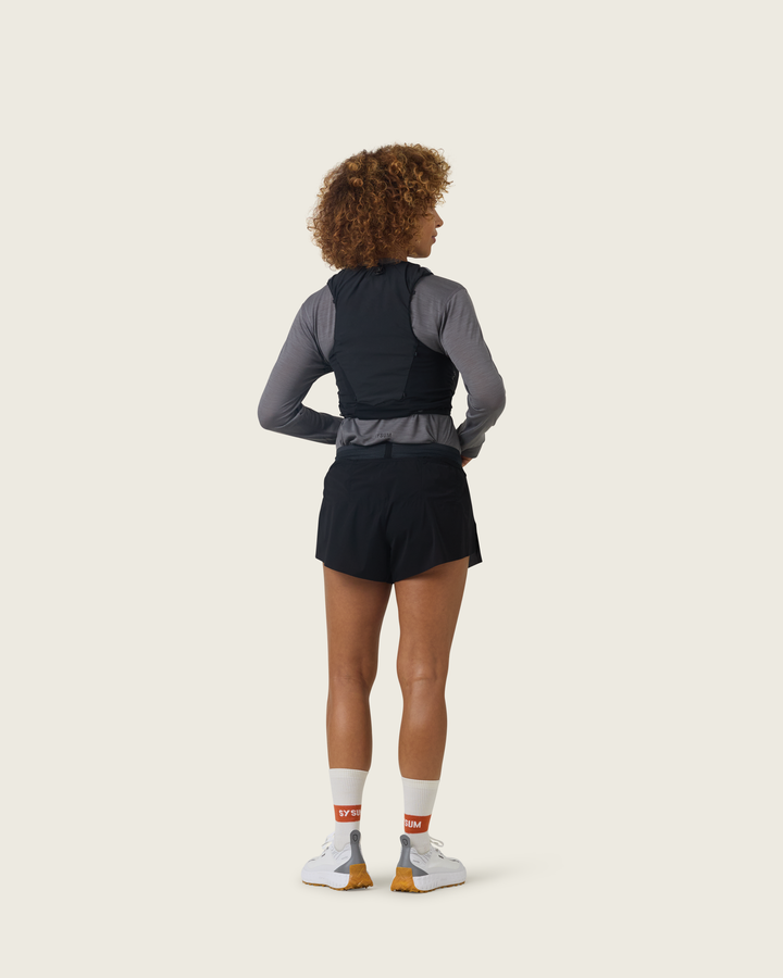 Women’s 3-inch Cordura® trail running shorts in Black from Sysum, ultra-light stretch fabric and pocket system visible, photographed in a neutral studio setting.