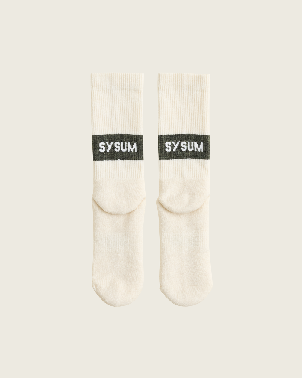 Woollen crew running socks in Moss from Sysum, mid-length design with cushioned zones and textured knit visible, photographed in a neutral studio setting.