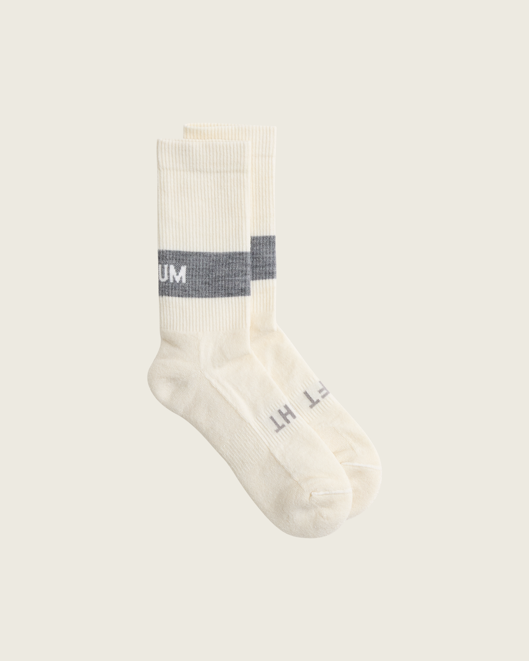 Woollen crew running socks in Slate from Sysum, mid-length design with cushioned zones and textured knit visible, photographed in a neutral studio setting.