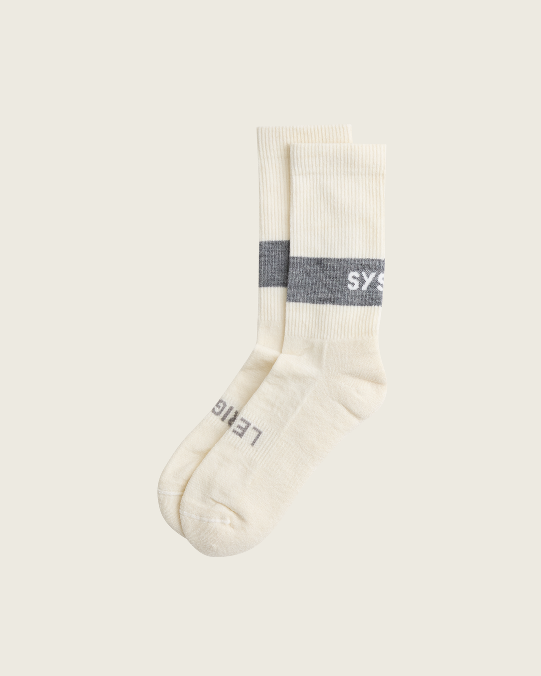 Woollen crew running socks in Slate from Sysum, mid-length design with cushioned zones and textured knit visible, photographed in a neutral studio setting.