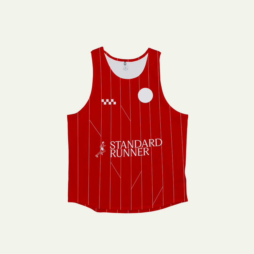 A red Participation singlet featuring a lightweight design and moisture-wicking fabric, ideal for running.