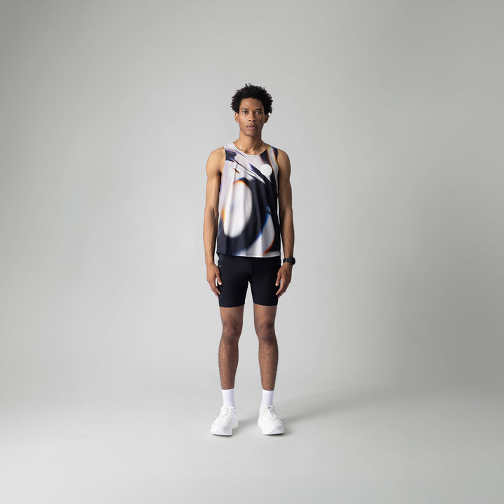 A stylish white glass effect singlet for activewear, showcasing breathable fabric and a sleeveless design.