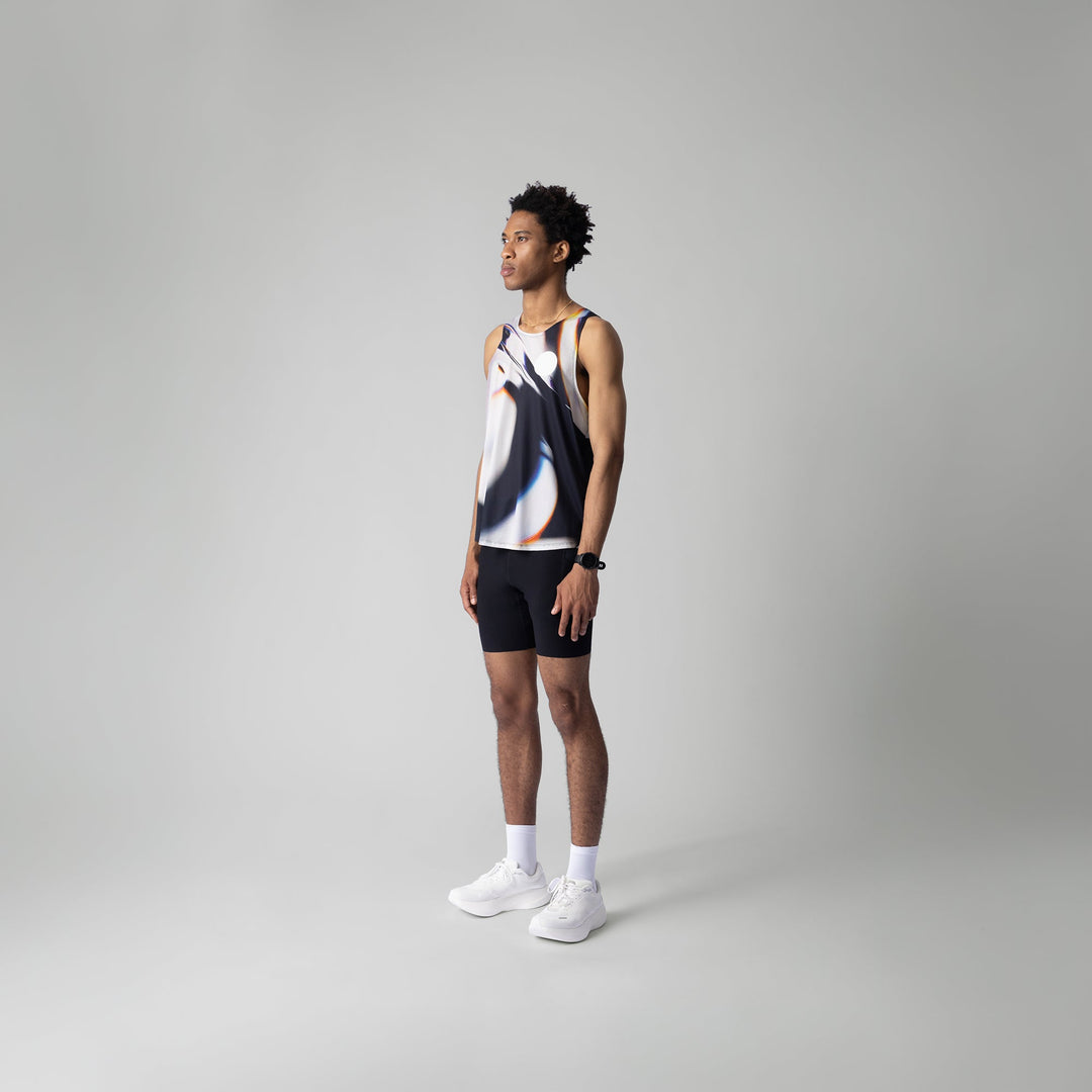 A stylish white glass effect singlet for activewear, showcasing breathable fabric and a sleeveless design.