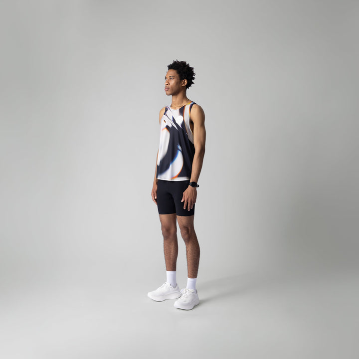 A stylish white glass effect singlet for activewear, showcasing breathable fabric and a sleeveless design.