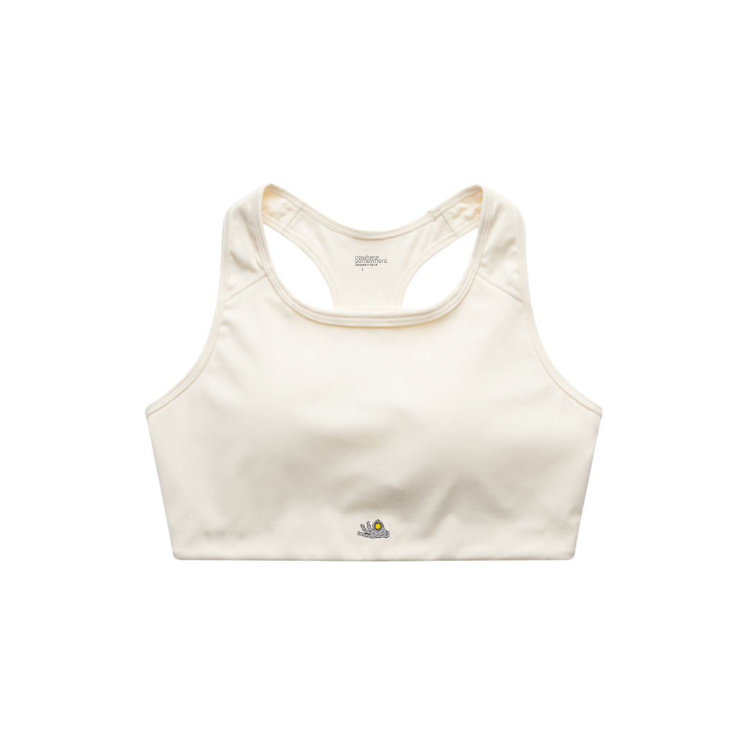 Nowhere Somewhere The Run Bra in cream with racerback design and matte performance fabric
