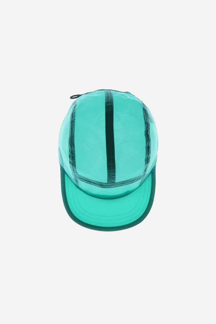 Lievre Running turquoise performance running cap, lightweight technical fabric with adjustable back cord and "Engineered for the Art of Running" text on the side panel.
