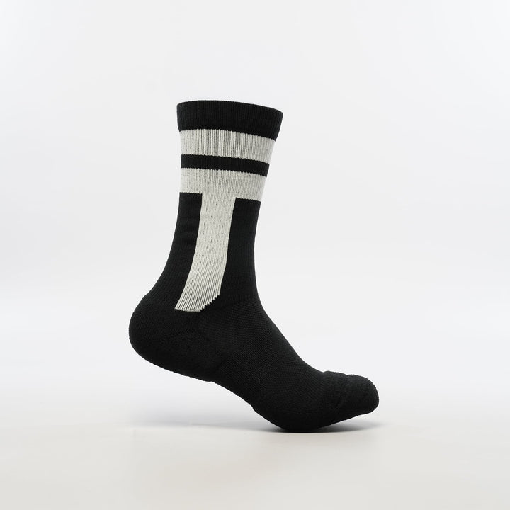 Black crew-length T2 Ultra Socks by Tabisuke Tabizo, featuring foot-mapped knit structure, arch compression, and Dralon Cotton fabric for trail running and fastpacking.