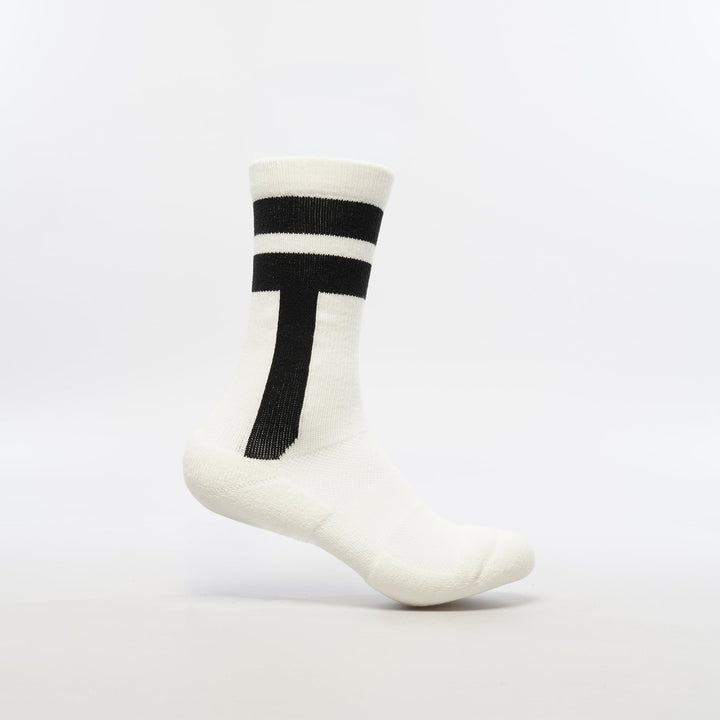 White crew-length T2 Ultra Socks by Tabisuke Tabizo, featuring foot-mapped knit structure, arch compression, and Dralon Cotton fabric for trail running and fastpacking.