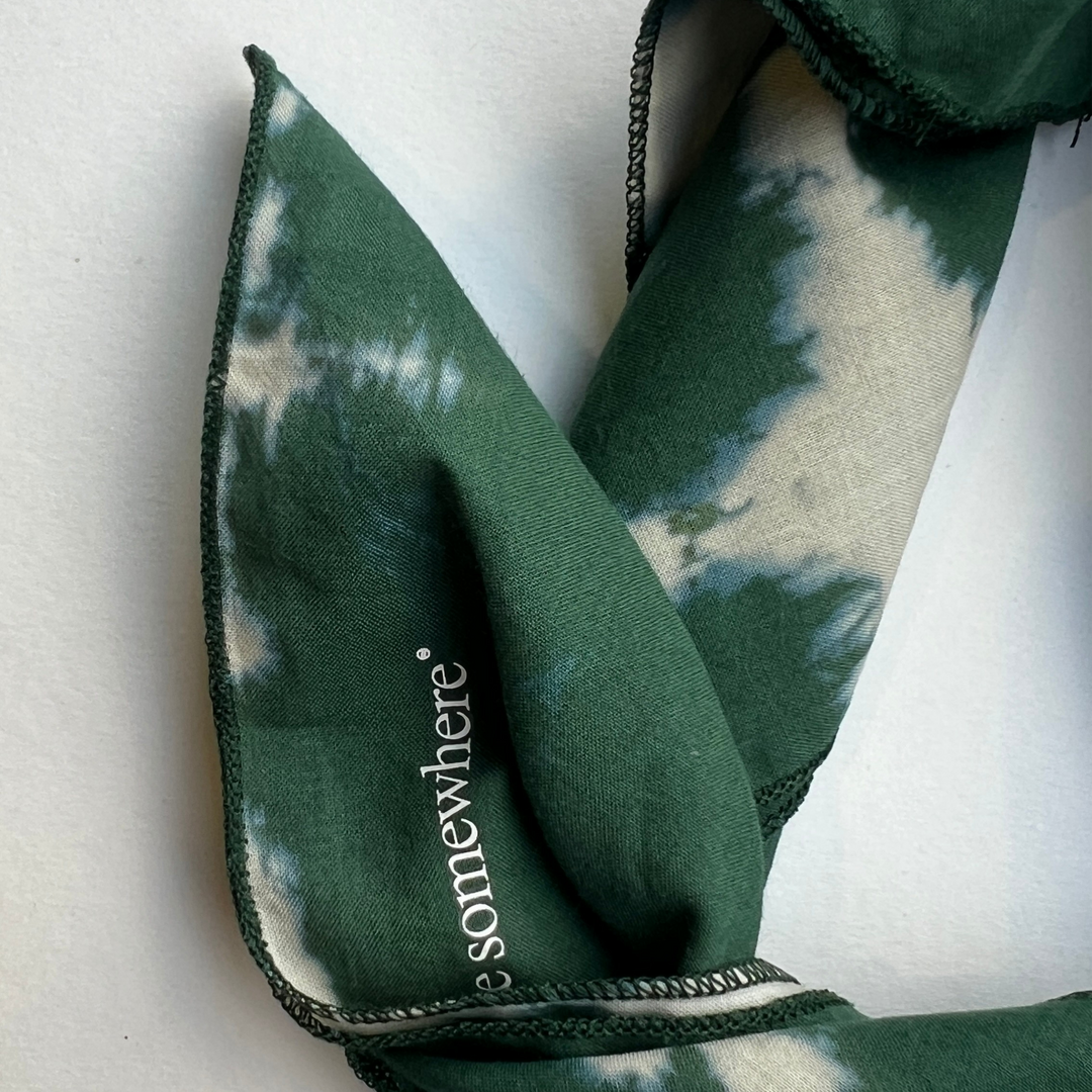 Nowhere Somewhere Peace Bandana in indigo, flat lay