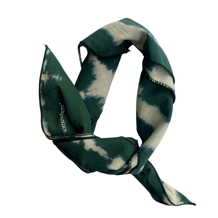 Nowhere Somewhere Peace Bandana in indigo, flat lay