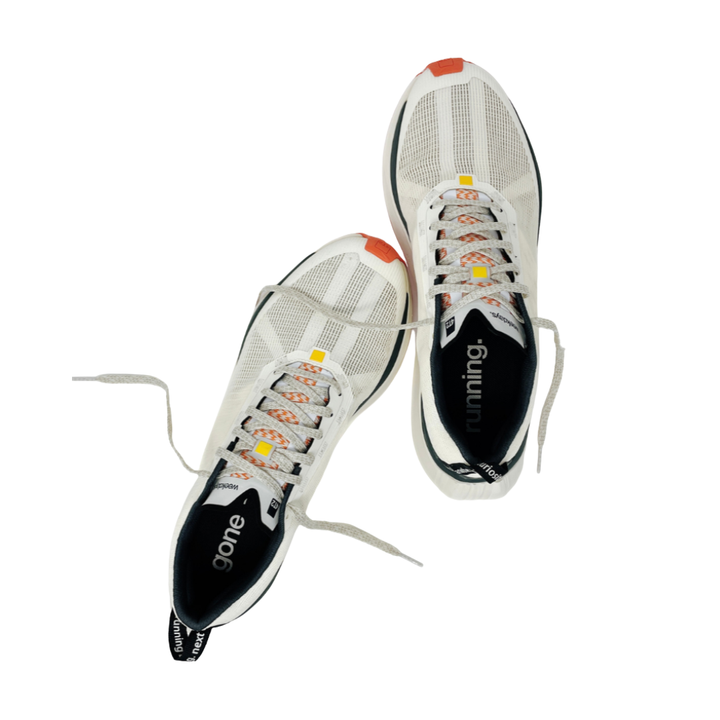 Close-up view of 4T2 weekdays vintage white running shoes showcasing comfort features and durable outsole.