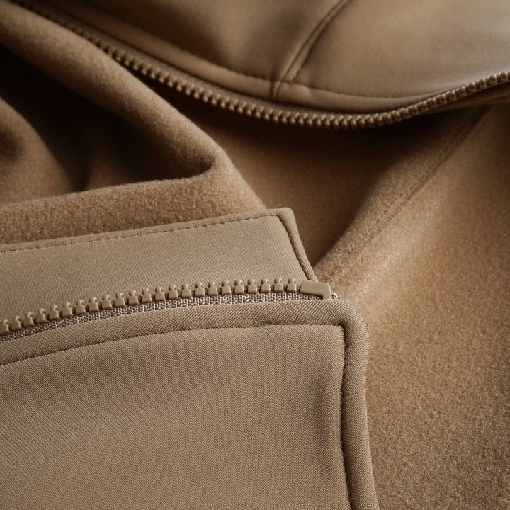 Tabisuke Tabizo T2 Jogger Jacket 2025 in brown, winter running jacket with Artica stretch fabric, thumbholes and watch opening