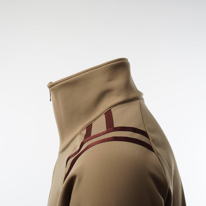 Tabisuke Tabizo T2 Jogger Jacket 2025 in brown, winter running jacket with Artica stretch fabric, thumbholes and watch opening